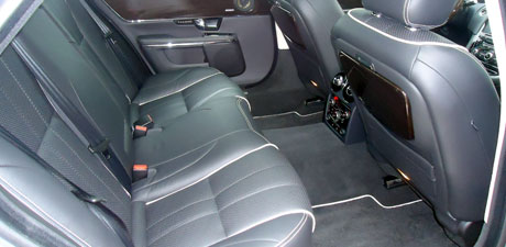 Spotless black leather rear seats after an interior detail