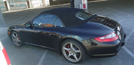 Black Porsche 911 with deep glossy black paint